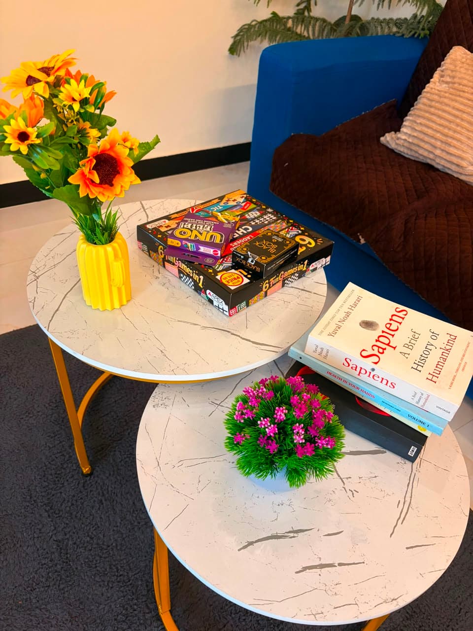 Board games and books on the marble table